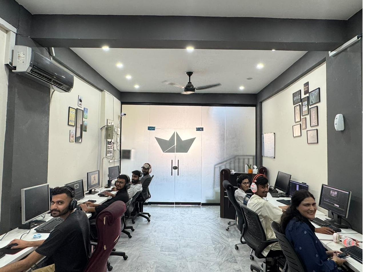 The WREDD studio team at their workstations